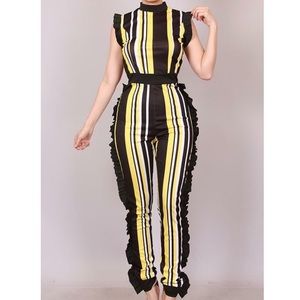 Multi color striped jumpsuit w/ruffle stretch trim